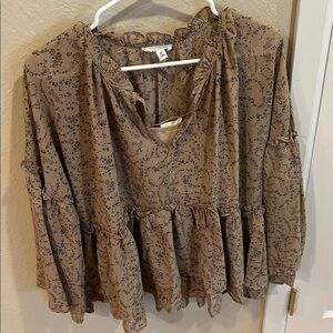 & MERCI Floral Patterned frilly long sleeve top. Size medium.